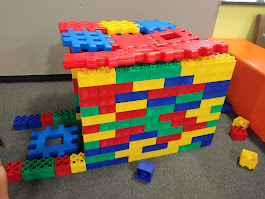 Colorful block building area at DinoDash