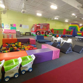 Indoor inflatable play area at DinoDash